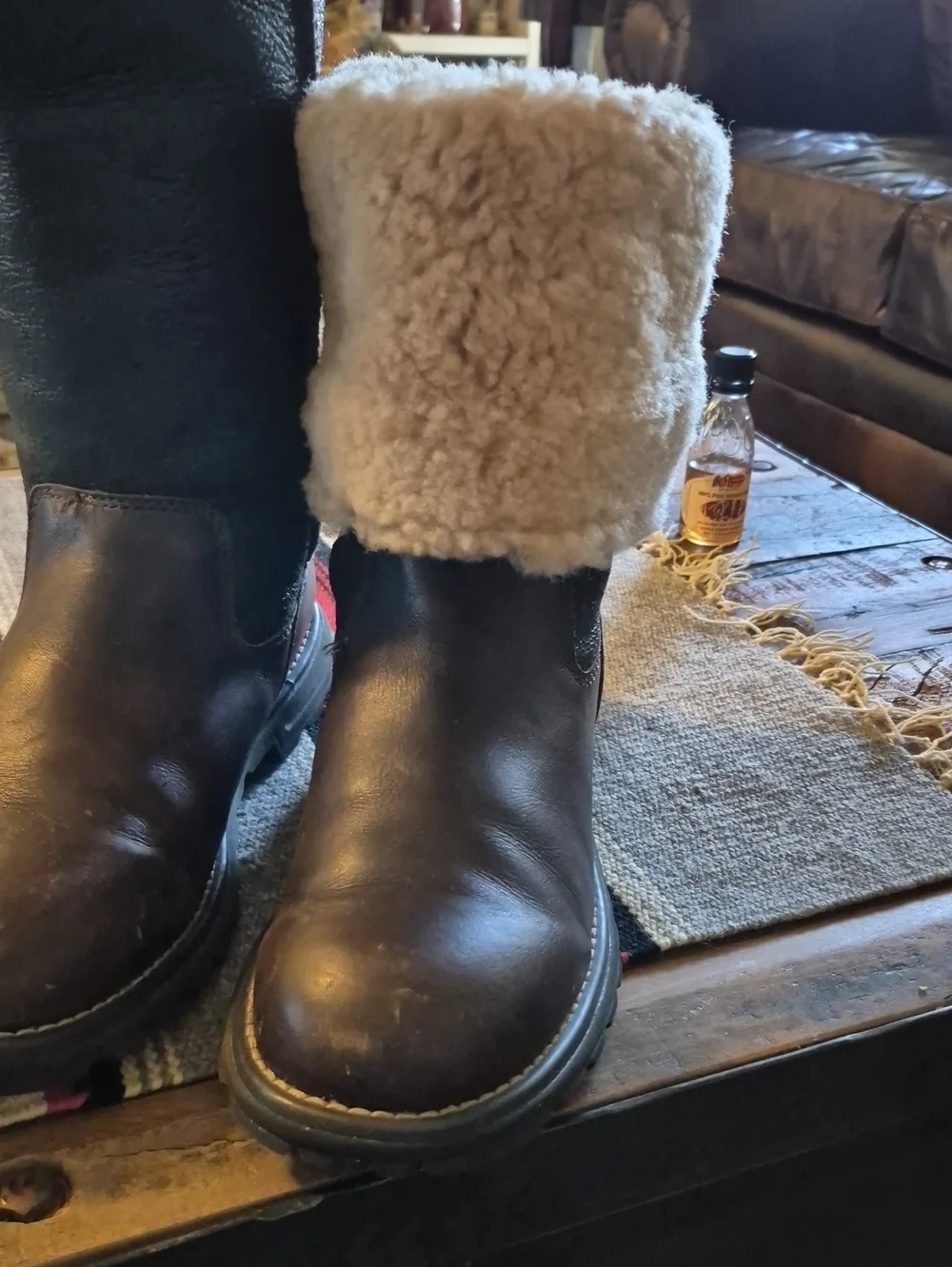 .UGG Brooks Tall model number 5490).VGC. Dark Brown Leather/sherling Insole